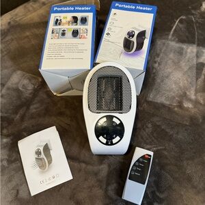 Set of 3 portable plug in heaters! All new!